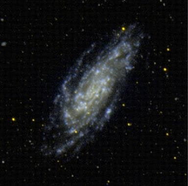 NGC 4559 - спиральная галактика с баром. Описание NGC 4559:, Галактика в созвездии Волосы Вероники