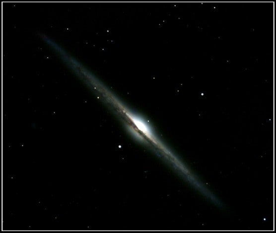 NGC 4565 - спиральная галактика. Описание NGC 4565:, Галактика в созвездии Волосы Вероники