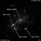 NGC 4395 - спиральная галактика с баром. Описание NGC 4395:, Галактика в созвездии Гончие Псы